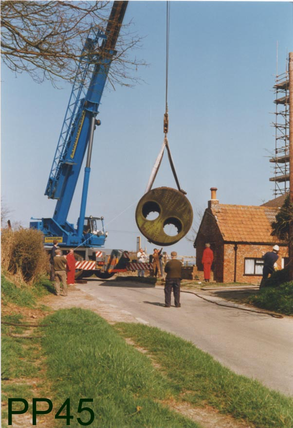 A crane moving the boiler