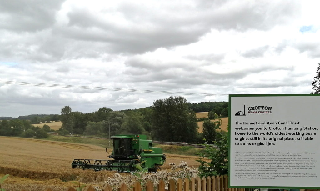 Harvester at work in the field next to Crofton Pumping Station